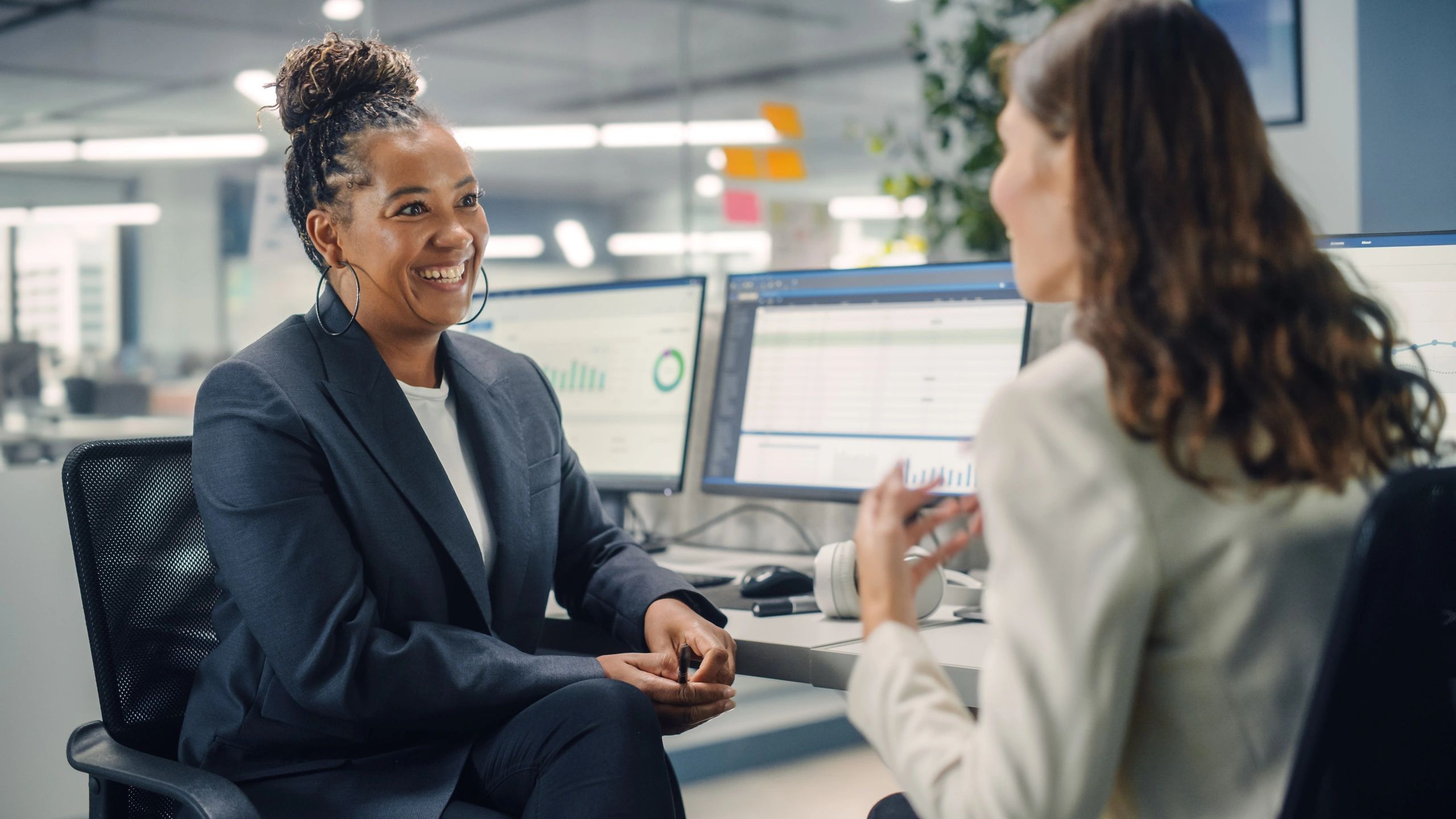 Team discussion in a modern trading office